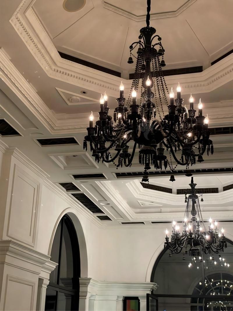 Dramatic antique black Baccarat chandelier with crystal layers, ideal for lounges, VIP rooms, and elegant dining. Dramatic antique black Baccarat chandelier with crystal layers, ideal for lounges, VIP rooms, and elegant dining.