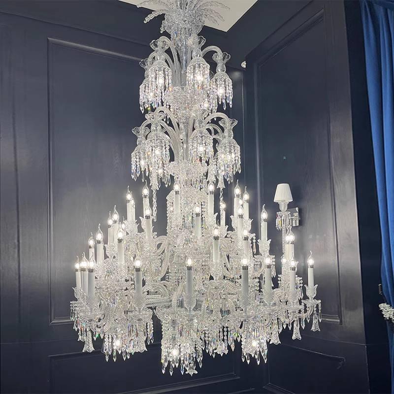 Sweeping arm Baccarat-style chandelier ideal for wedding venues, luxury resorts, and spacious foyers. Sweeping arm Baccarat-style chandelier ideal for wedding venues, luxury resorts, and spacious foyers.