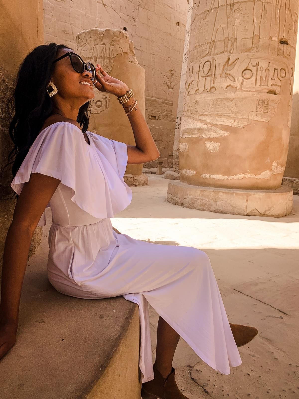 CulturesUncovered Brit Thompson Egypt Karnak Temple towers hieroglyphics in Luxor desert black girls solo travel CulturesUncovered Brit Thompson Egypt Karnak Temple towers hieroglyphics in Luxor desert black girls solo travel