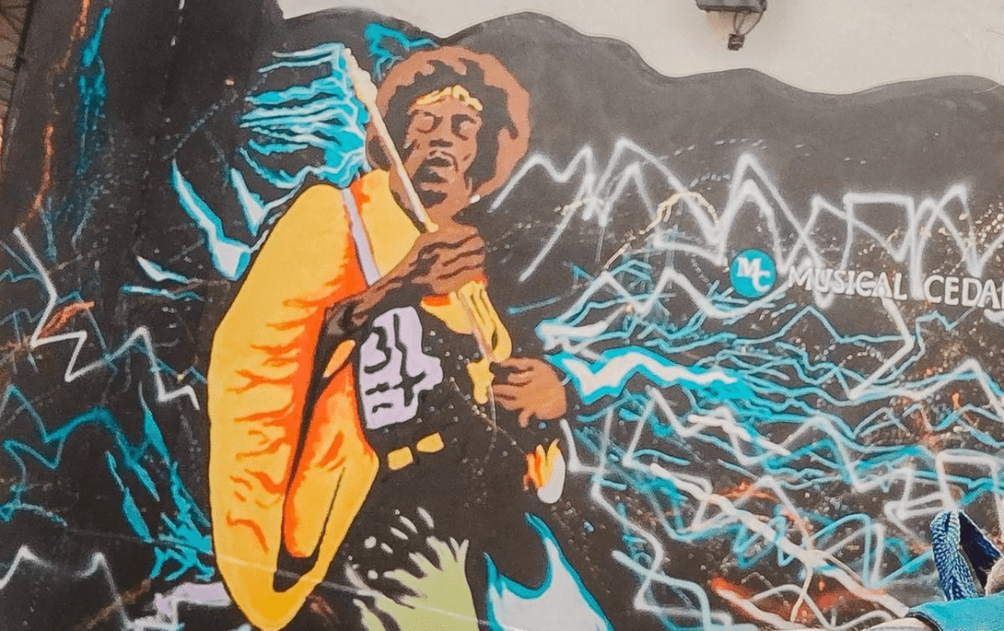 street art of jimi hendrix playing the guitar street art of jimi hendrix playing the guitar