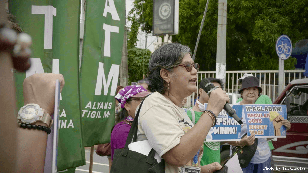 Judy Pasimio, Overall Cordinator of LILAK Purple Action for Indigenous Women's Rights giving her solidarity message during SONA action. Judy Pasimio, Overall Cordinator of LILAK Purple Action for Indigenous Women's Rights giving her solidarity message during SONA action.