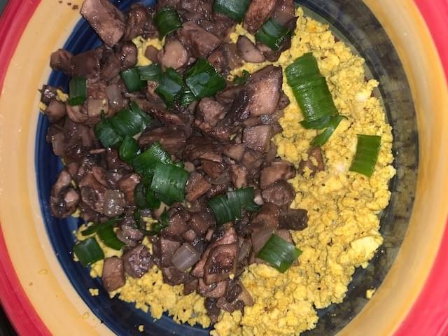 Extra firm tofu "eggs" w/ sauted mushrooms and scallions. Extra firm tofu "eggs" w/ sauted mushrooms and scallions.