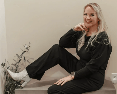 Brenda Hogsett of SKINTASTIC, Modesto esthetician and licensed skincare expert, sitting confidently in studio portrait Brenda Hogsett of SKINTASTIC, Modesto esthetician and licensed skincare expert, sitting confidently in studio portrait