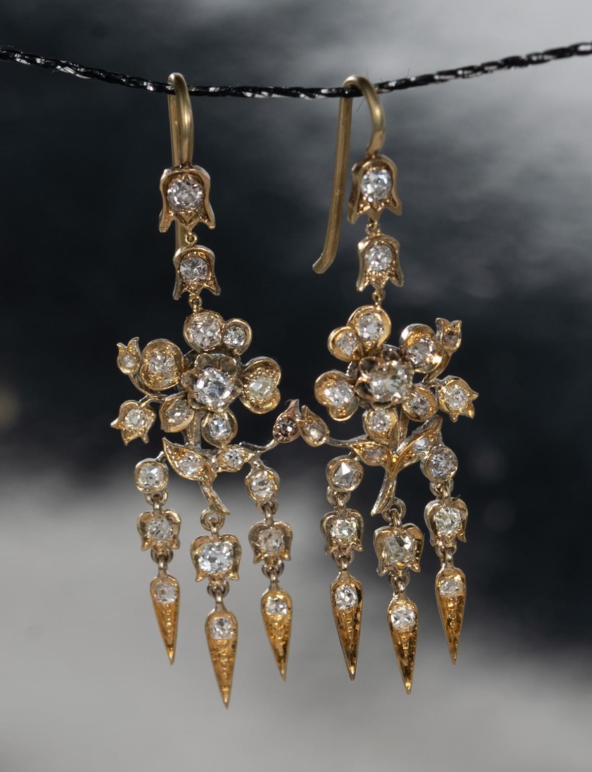 Diamond flower dangling earrings