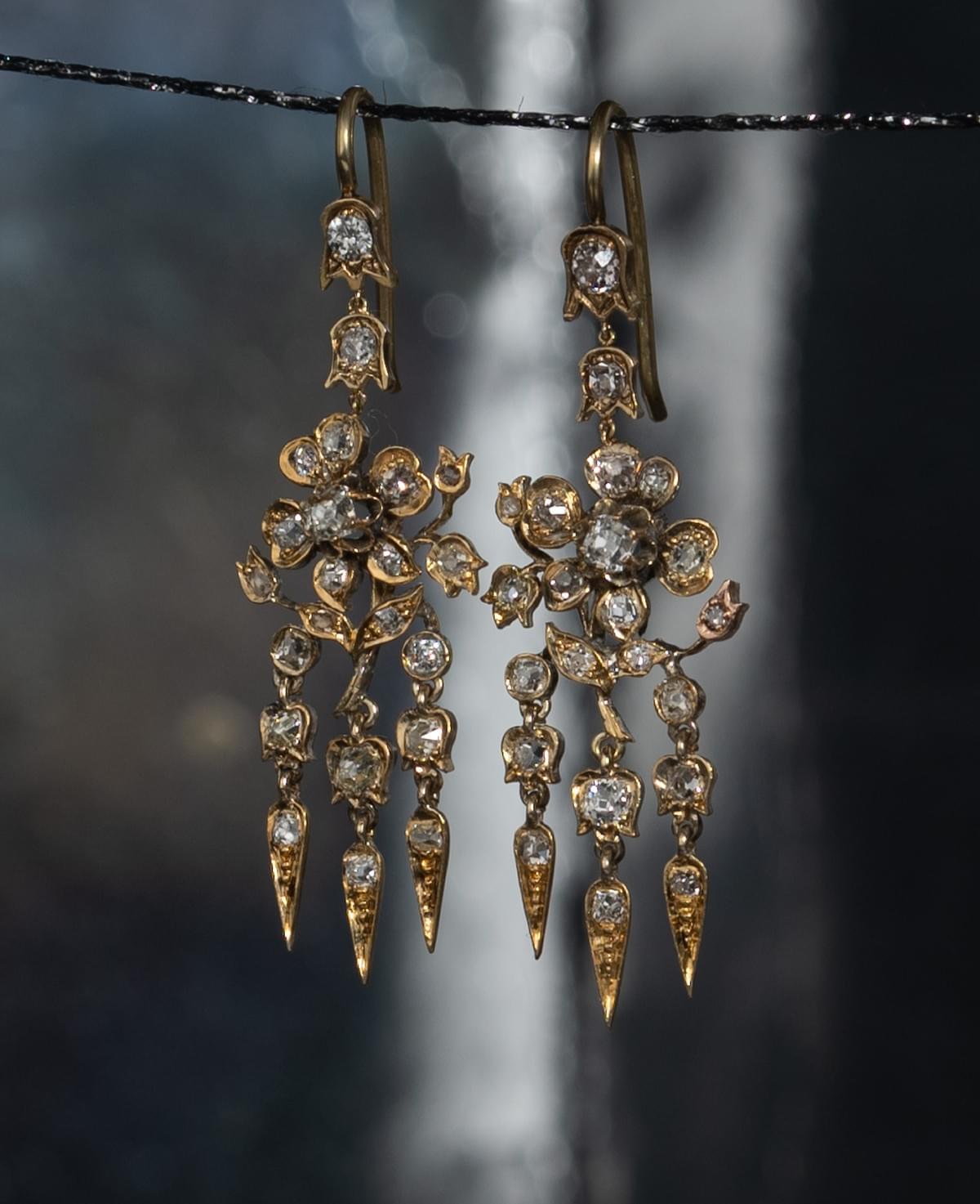 Diamond flower dangling earrings