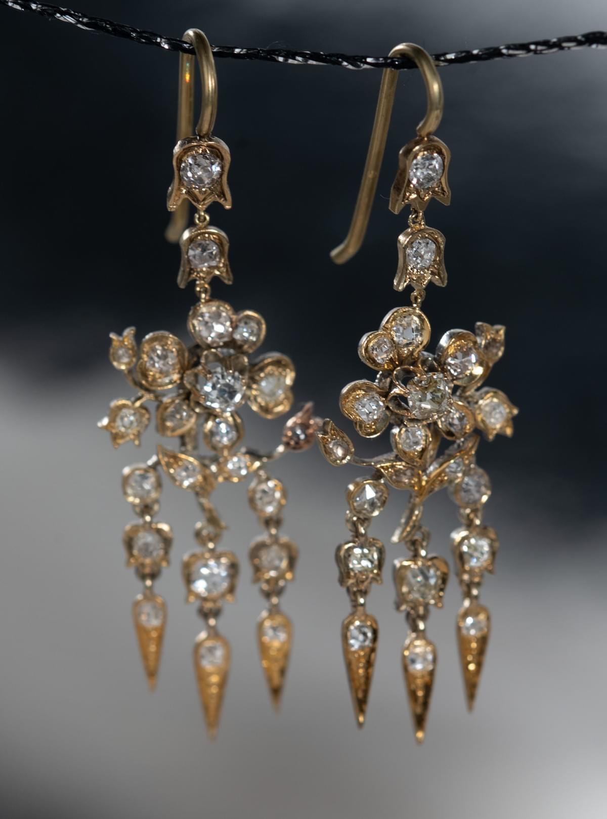 Diamond flower dangling earrings