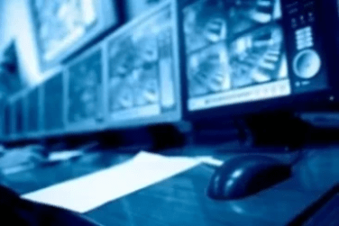 Multiple monitor screens display used for Monitoring Alarm Systems Multiple monitor screens display used for Monitoring Alarm Systems