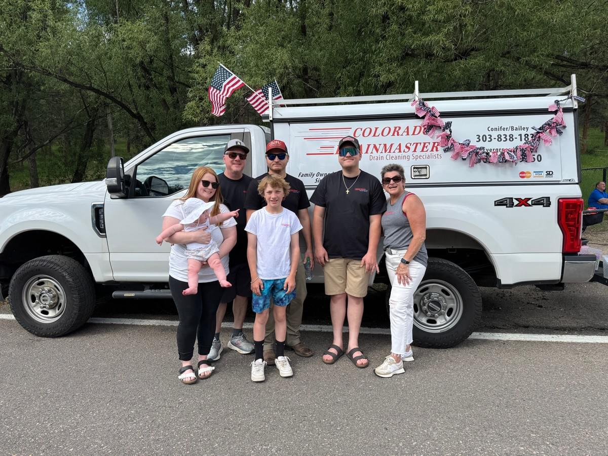 Colorado Drainmaster truck with the Hughs Family at the Evergreen Parade. Colorado Drainmaster truck with the Hughs Family at the Evergreen Parade.