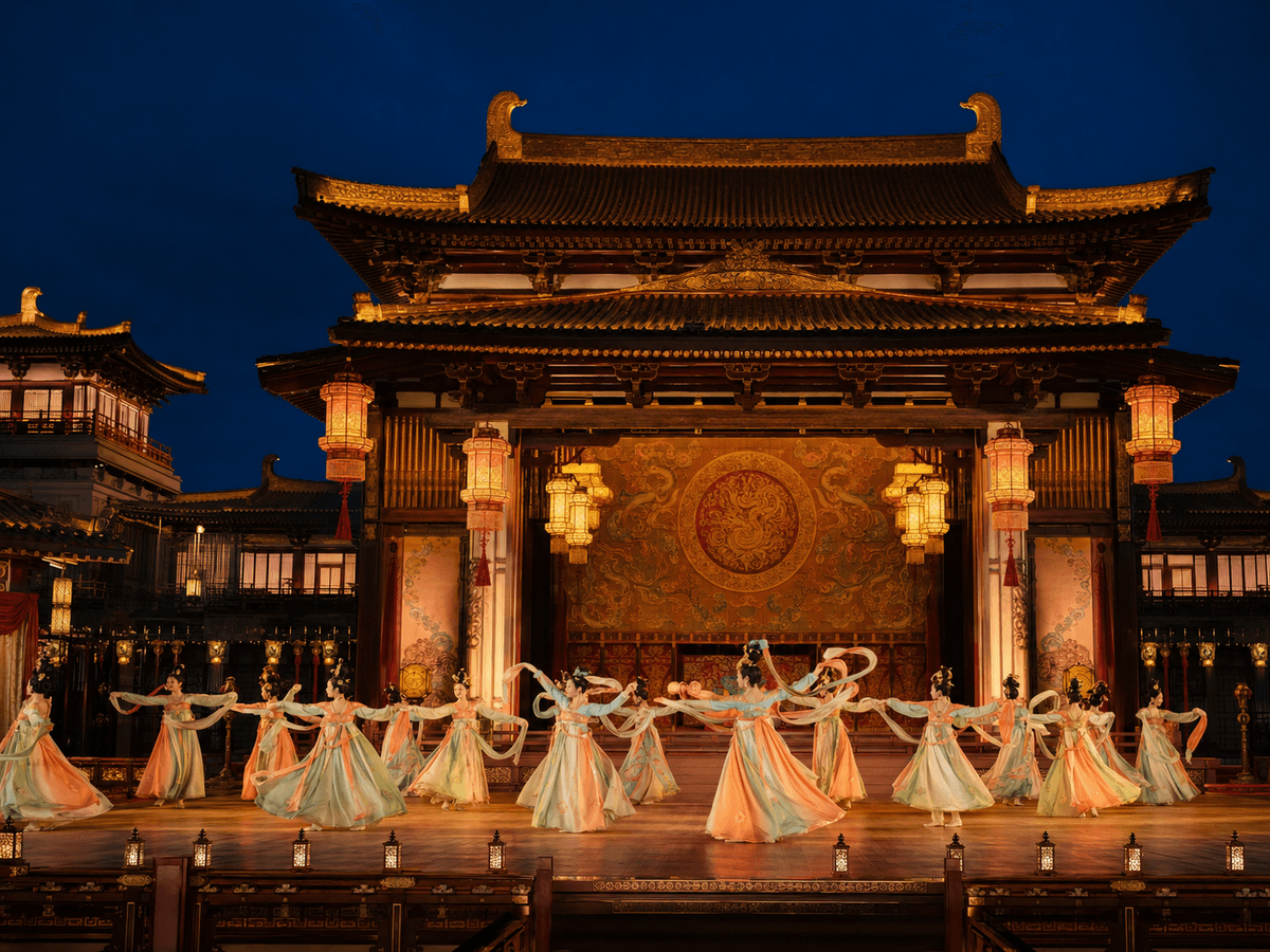 Tang Dynasty-inspired cultural performance with dancers in flowing costumes on an ornate Xi’an stage. Tang Dynasty-inspired cultural performance with dancers in flowing costumes on an ornate Xi’an stage.
