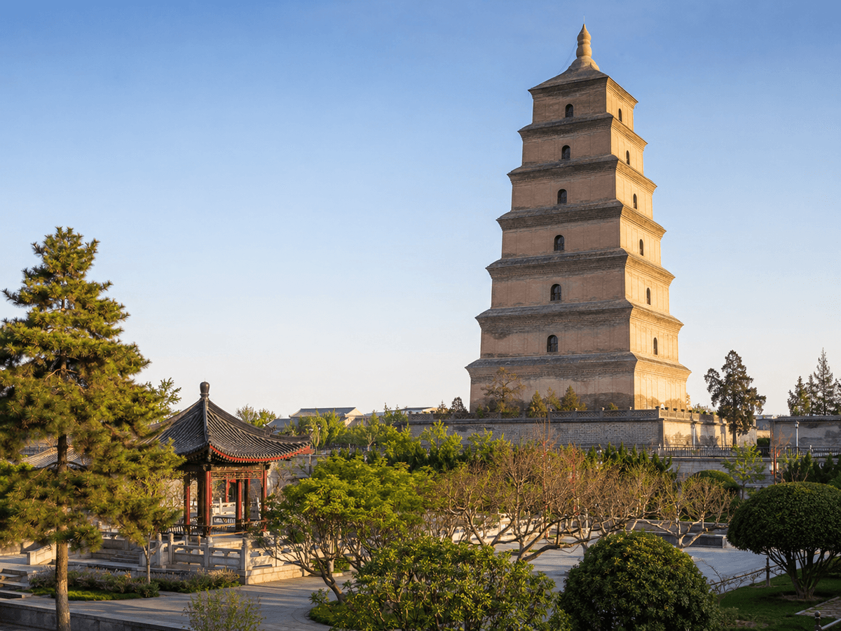Big Wild Goose Pagoda rising above landscaped gardens in Xi’an during golden morning light. Big Wild Goose Pagoda rising above landscaped gardens in Xi’an during golden morning light.