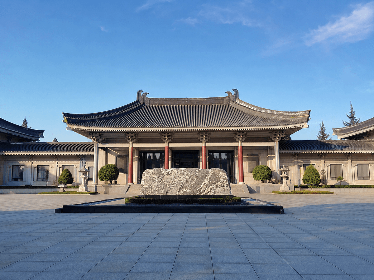 Tang-style exterior of the Shaanxi History Museum beneath a clear blue sky in Xi’an Tang-style exterior of the Shaanxi History Museum beneath a clear blue sky in Xi’an