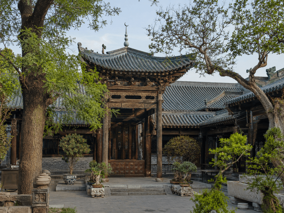 Traditional Chinese courtyard and tiled pavilion inside the Great Mosque of Xi’an. Traditional Chinese courtyard and tiled pavilion inside the Great Mosque of Xi’an.