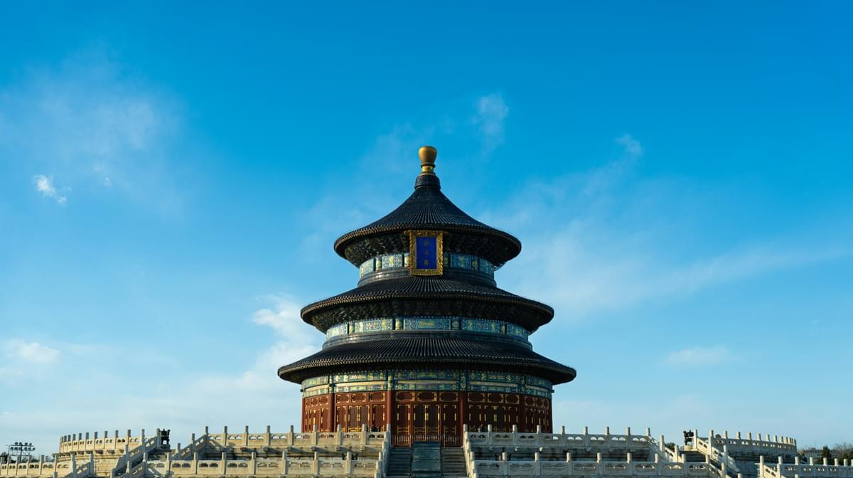 The Temple of Heaven's iconic blue-roofed Hall of Prayer for Good Harvests standing tall against a clear blue sky in Beijing The Temple of Heaven's iconic blue-roofed Hall of Prayer for Good Harvests standing tall against a clear blue sky in Beijing