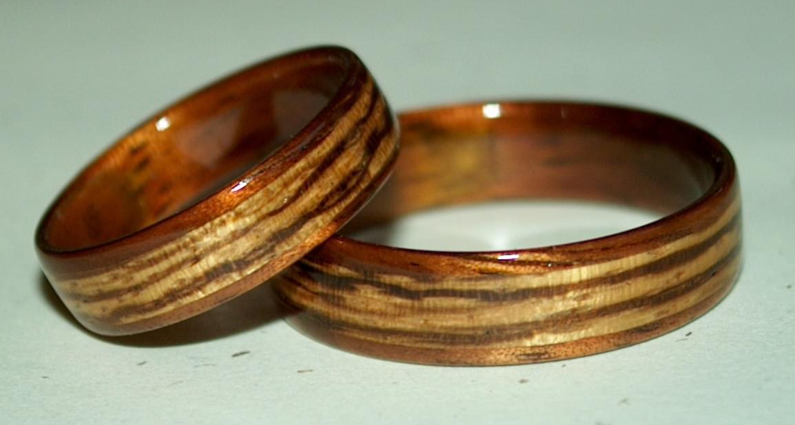 Hawaiian Koa wood rings with wide Zebrawood inlays Hawaiian Koa wood rings with wide Zebrawood inlays
