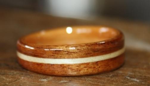 Rosewood, with Ash inlay and Cherry liner. Gently tapered Rosewood, with Ash inlay and Cherry liner. Gently tapered