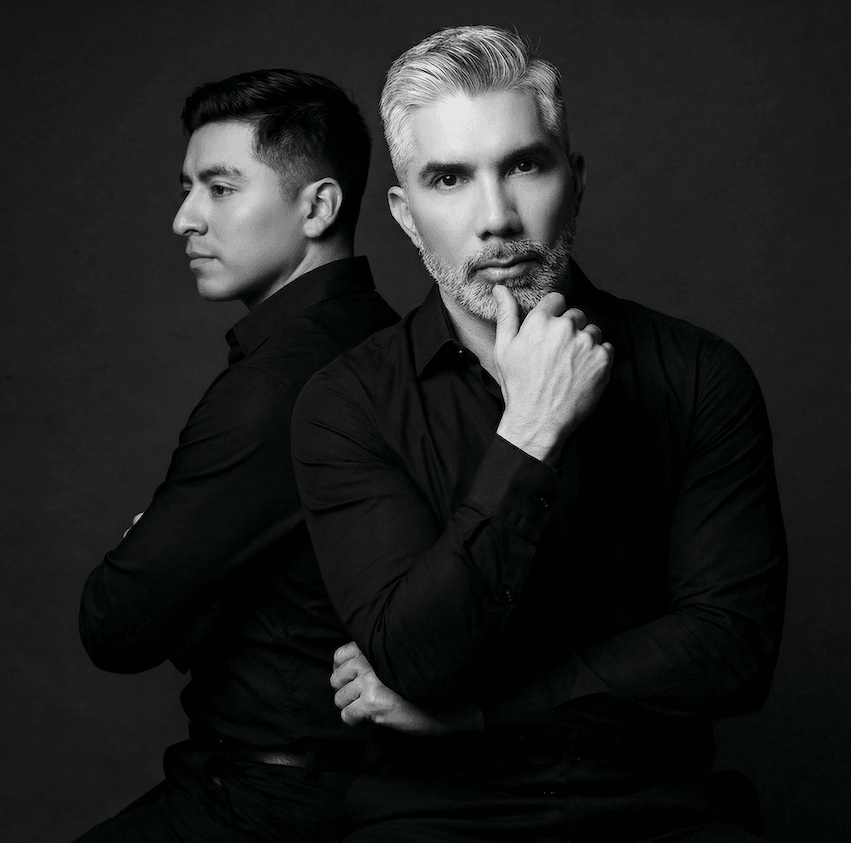 Black-and-white portrait of Ariosto Rivera artists Joaquín Ariosto and Jesús Rivera, the Mexico City duo creating contemporary Mexican art through the traditional popotillo technique. Black-and-white portrait of Ariosto Rivera artists Joaquín Ariosto and Jesús Rivera, the Mexico City duo creating contemporary Mexican art through the traditional popotillo technique.
