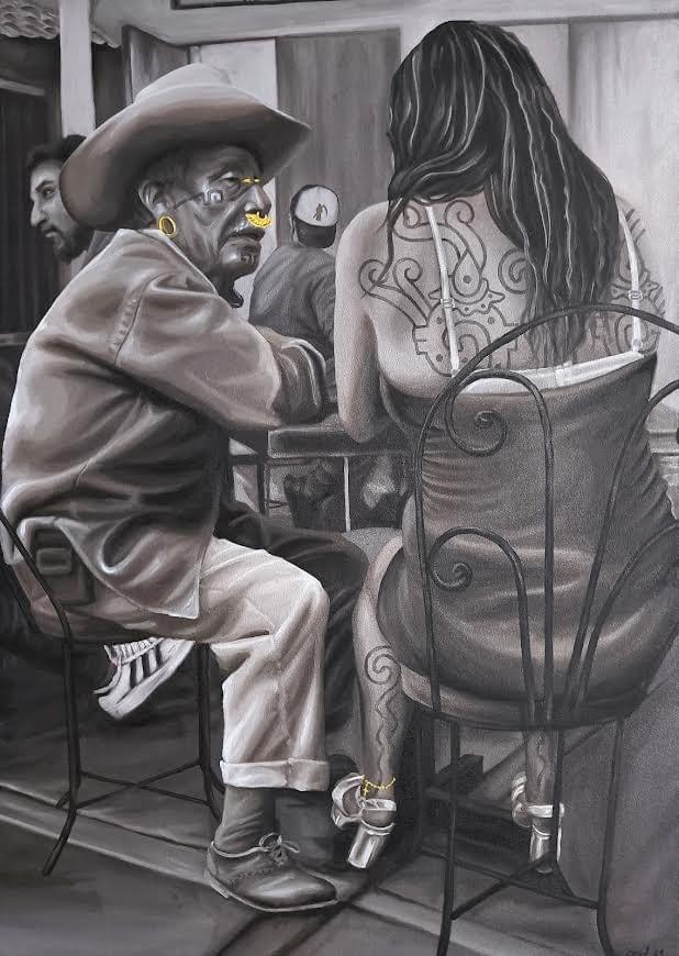 Black and grey painting by Tlacolulokos showing an Indigenous inspired man sitting at a table beside a tattooed woman, blending contemporary urban life with ancestral symbolism and cultural identity Black and grey painting by Tlacolulokos showing an Indigenous inspired man sitting at a table beside a tattooed woman, blending contemporary urban life with ancestral symbolism and cultural identity