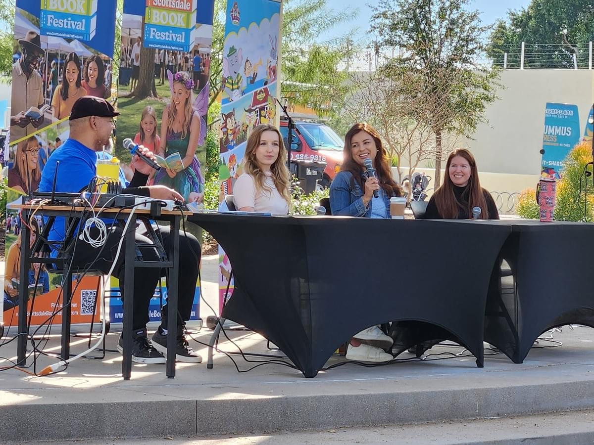 Panel discussion at the Scottsdale Book Festival featuring authors and moderators speaking on children’s books and storytelling Panel discussion at the Scottsdale Book Festival featuring authors and moderators speaking on children’s books and storytelling