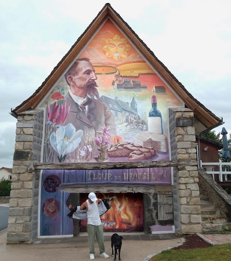 Large-scale mural by Mexican artist Nick Mestizo featuring a historical figure, rural village imagery, flowers, and local cultural symbols, celebrating community heritage and regional identity. Large-scale mural by Mexican artist Nick Mestizo featuring a historical figure, rural village imagery, flowers, and local cultural symbols, celebrating community heritage and regional identity.