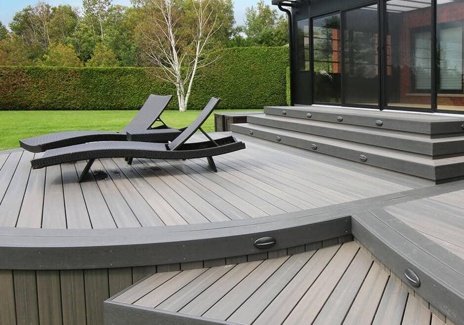 Low maintenance backyards featuring timber decking vs artificial lawn Low maintenance backyards featuring timber decking vs artificial lawn