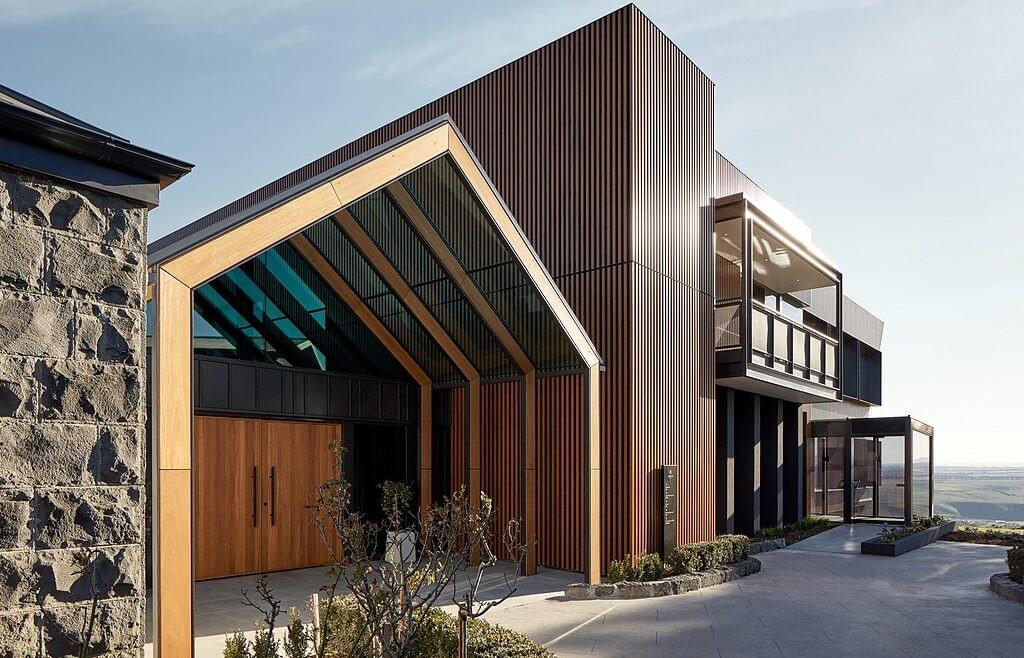 Stylish external wall cladding enhancing outdoor space aesthetics. Stylish external wall cladding enhancing outdoor space aesthetics.
