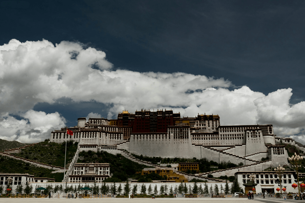 Stunning view of potala palace during sunset showcasing architectural marvel Stunning view of potala palace during sunset showcasing architectural marvel