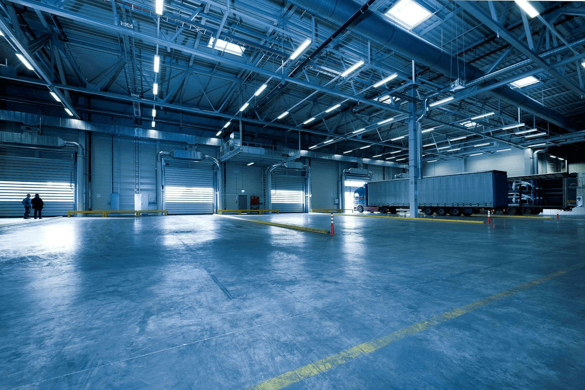 cargo lift transporting goods in a warehouse setting cargo lift transporting goods in a warehouse setting