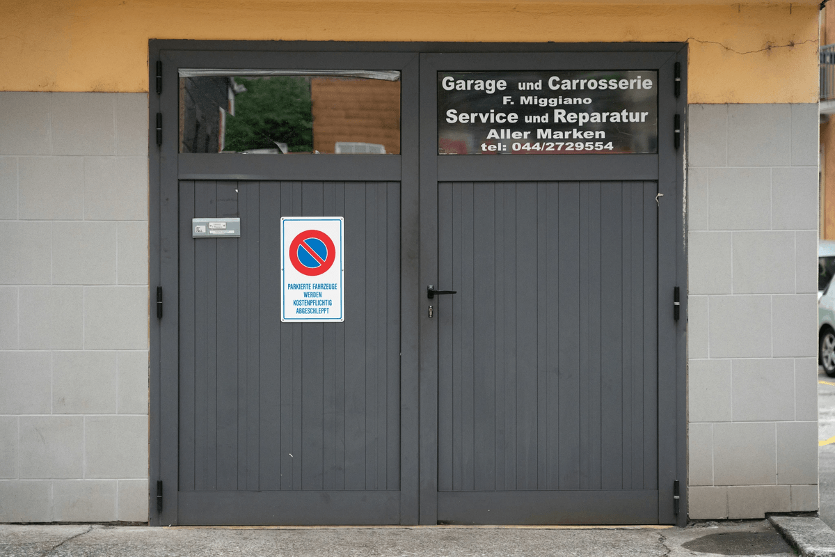 Garage Door Inspection focusing on panels and track damage Garage Door Inspection focusing on panels and track damage