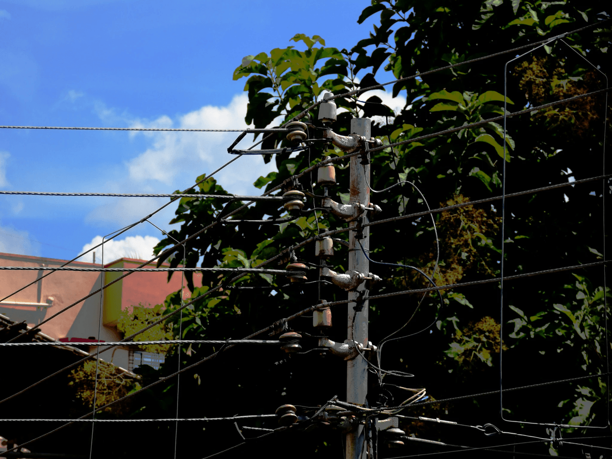 High-voltage overhead transmission lines carrying electricity efficiently. High-voltage overhead transmission lines carrying electricity efficiently.