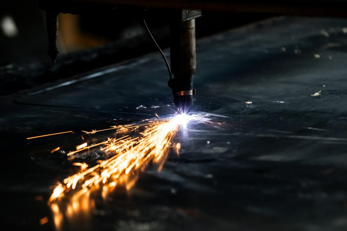 laser machine cutting process in action showing precision cuts laser machine cutting process in action showing precision cuts