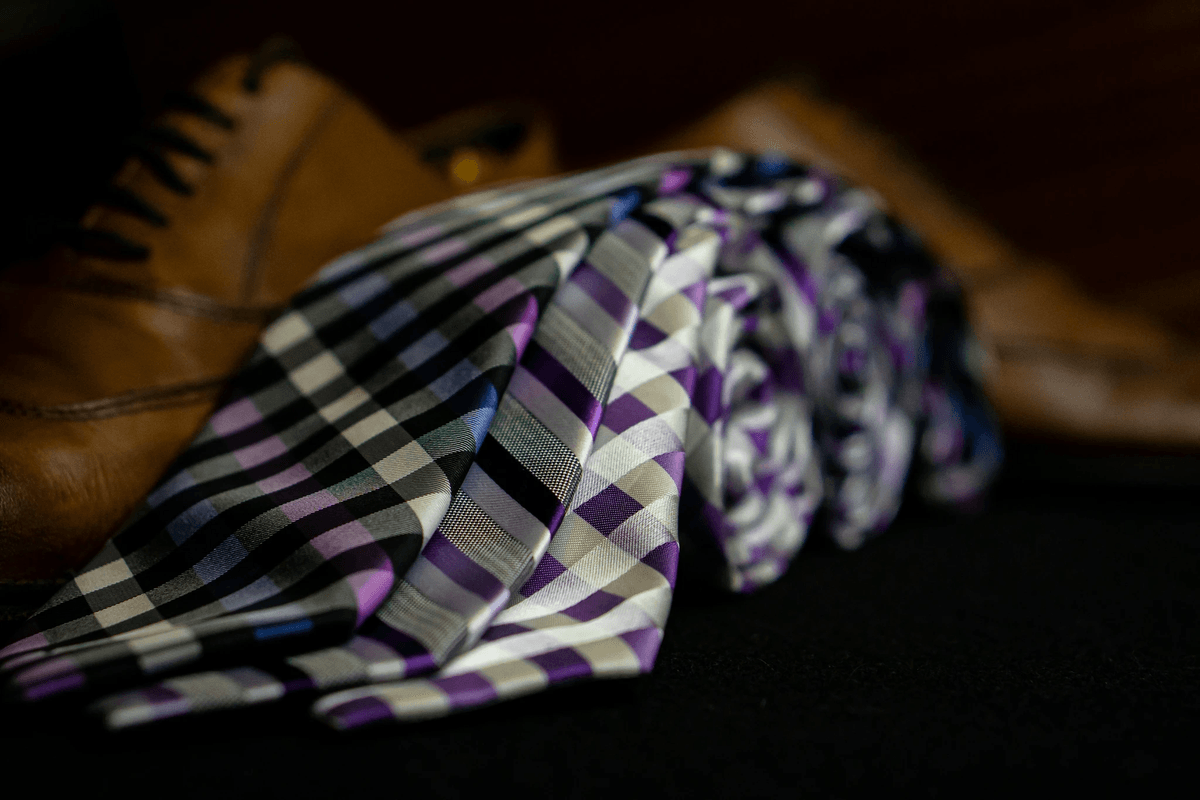 Neckwear Inspection process focusing on quality checks for scarves and bow ties. Neckwear Inspection process focusing on quality checks for scarves and bow ties.