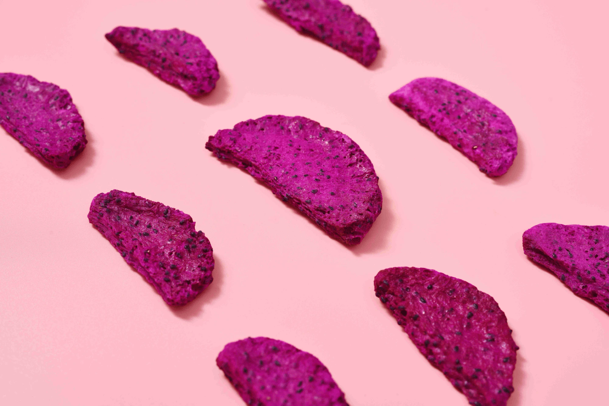 Colorful display of freeze dried dragon fruit showcasing its unique texture. Colorful display of freeze dried dragon fruit showcasing its unique texture.