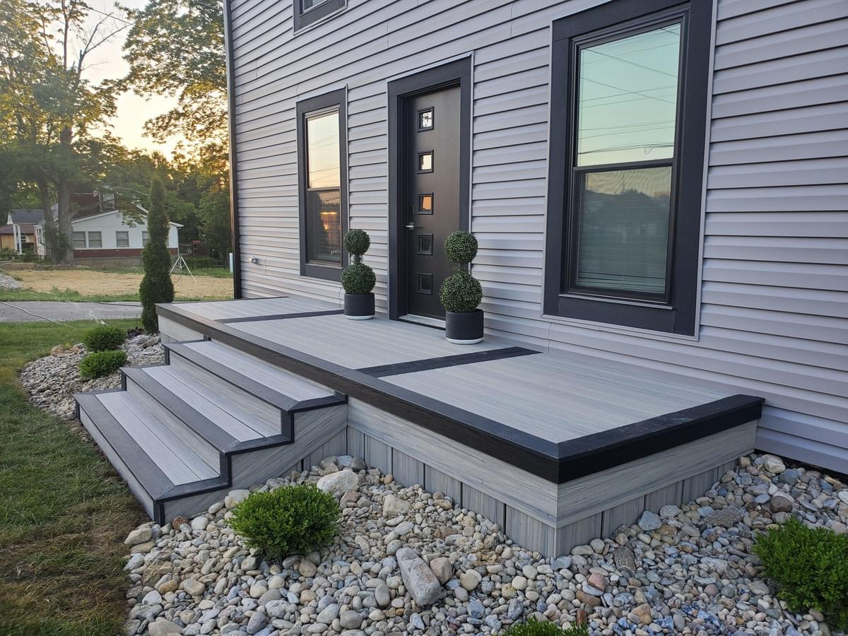 Stunning view of a picture framed deck enhancing outdoor aesthetics. Stunning view of a picture framed deck enhancing outdoor aesthetics.