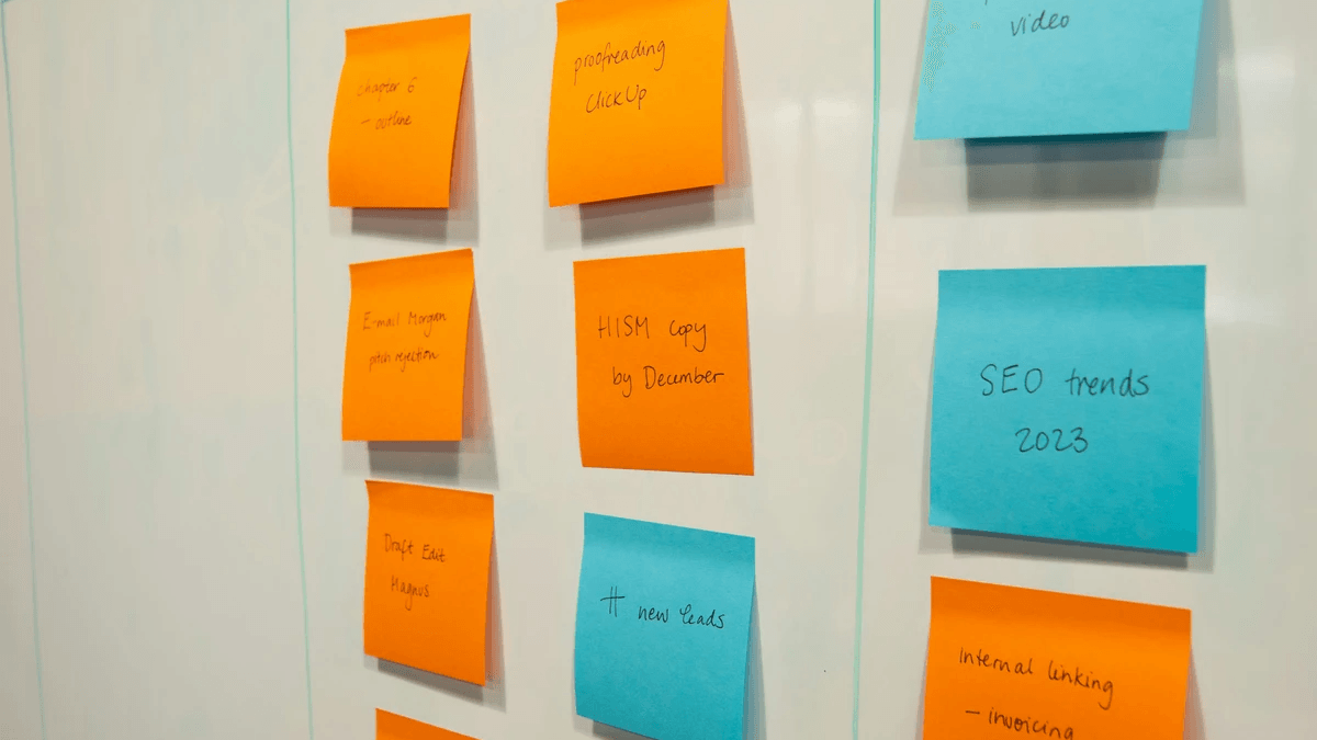 Color-coded notes arranged on a planning wall to organize a business narrative Color-coded notes arranged on a planning wall to organize a business narrative