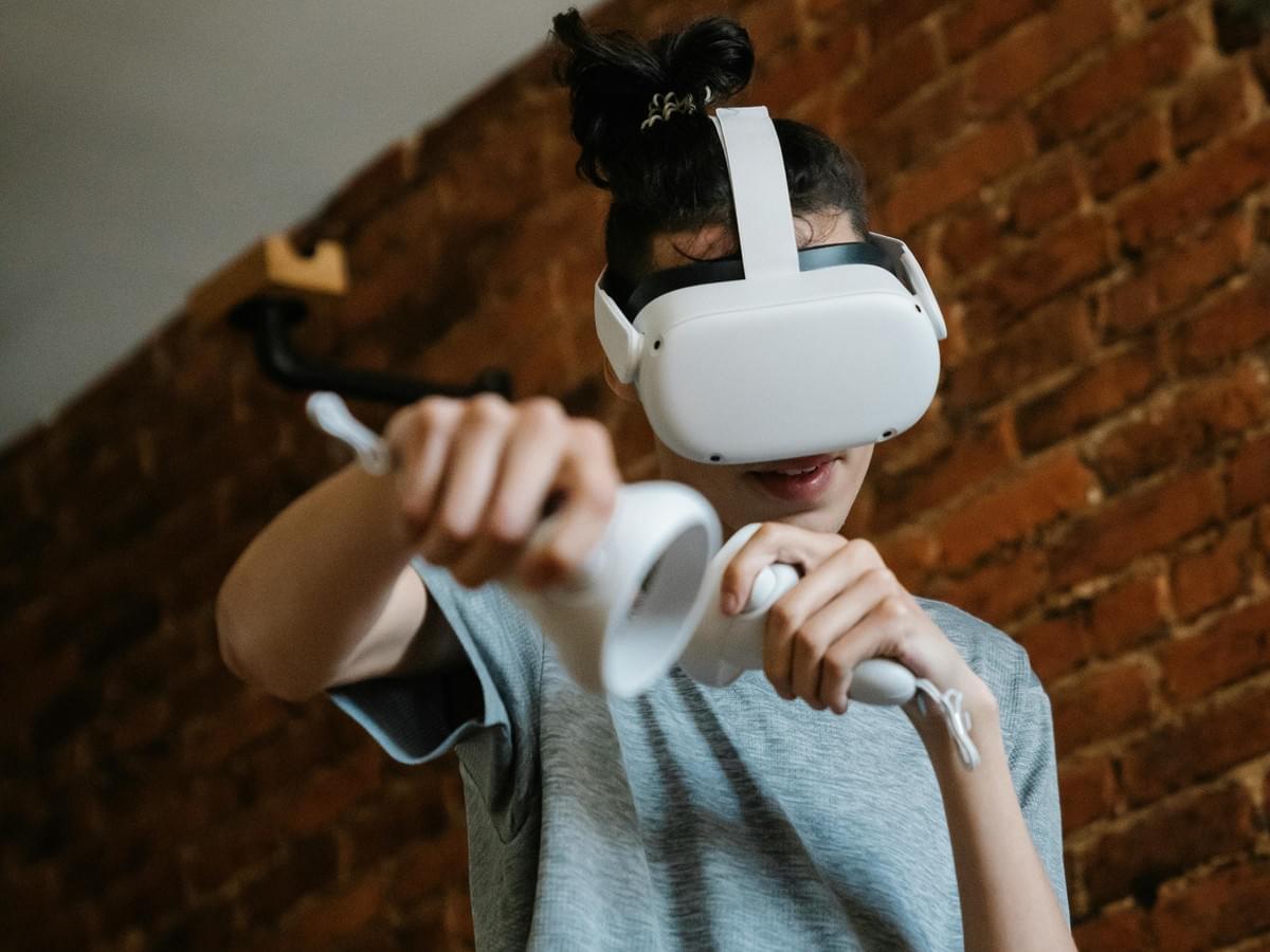 Player using ai smart glasses for immersive gaming experience Player using ai smart glasses for immersive gaming experience