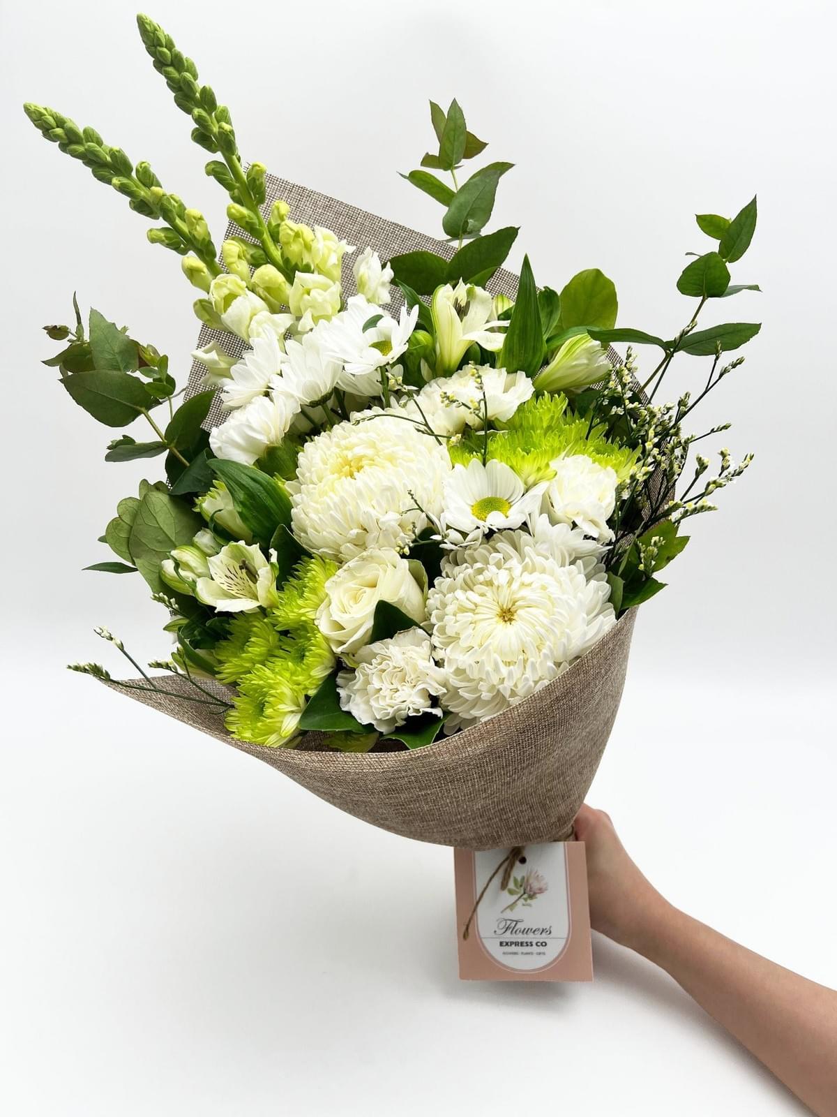Beautiful display of an artificial white flower bouquet Beautiful display of an artificial white flower bouquet