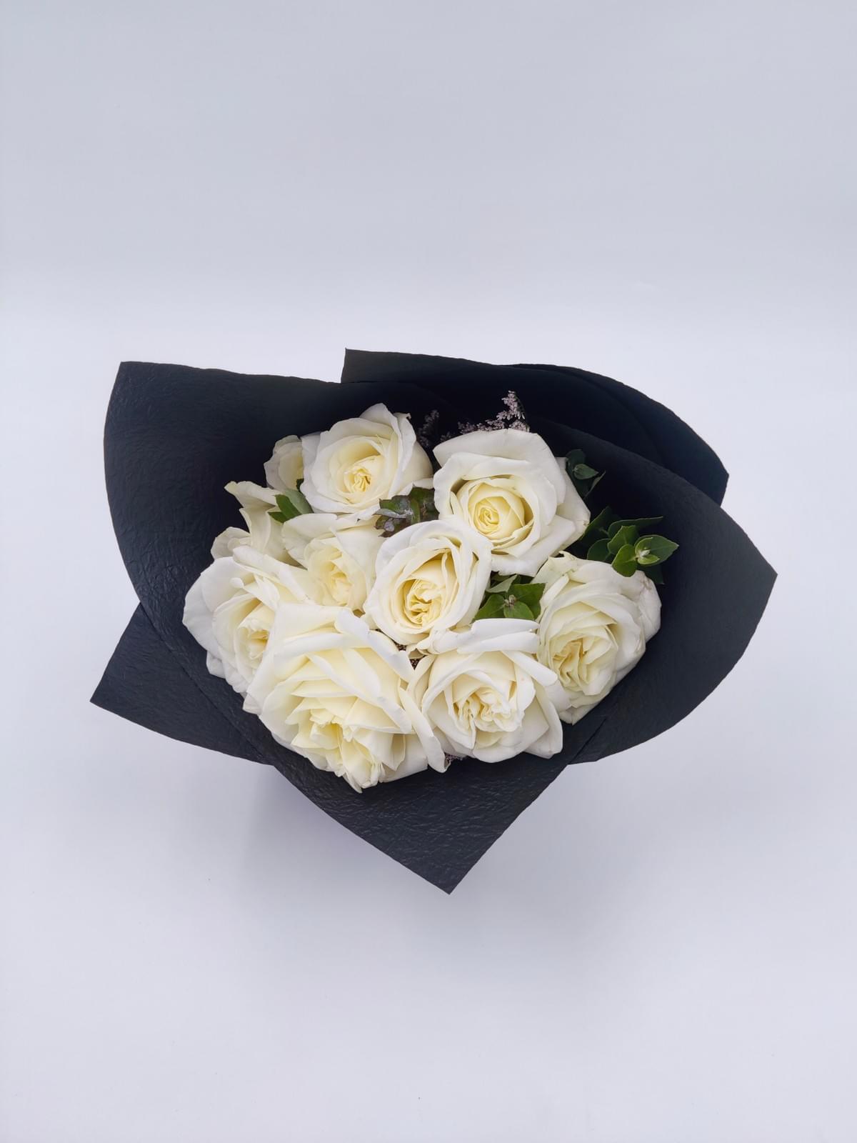 meaning of white roses expressed through memorial arrangements meaning of white roses expressed through memorial arrangements