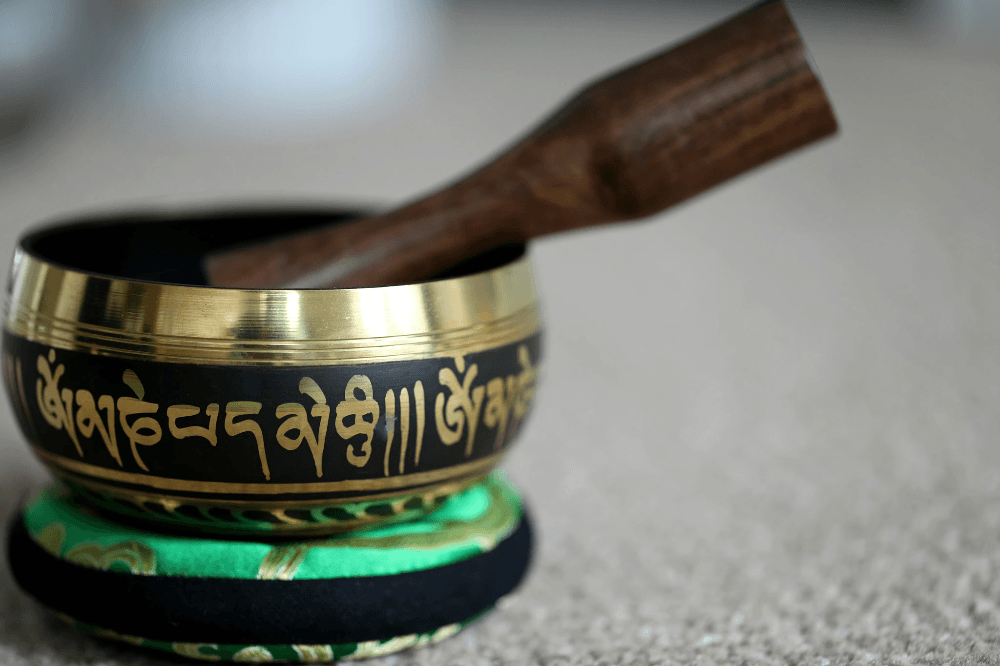 Authentic tibetan bowls showcased alongside prayer flags Authentic tibetan bowls showcased alongside prayer flags