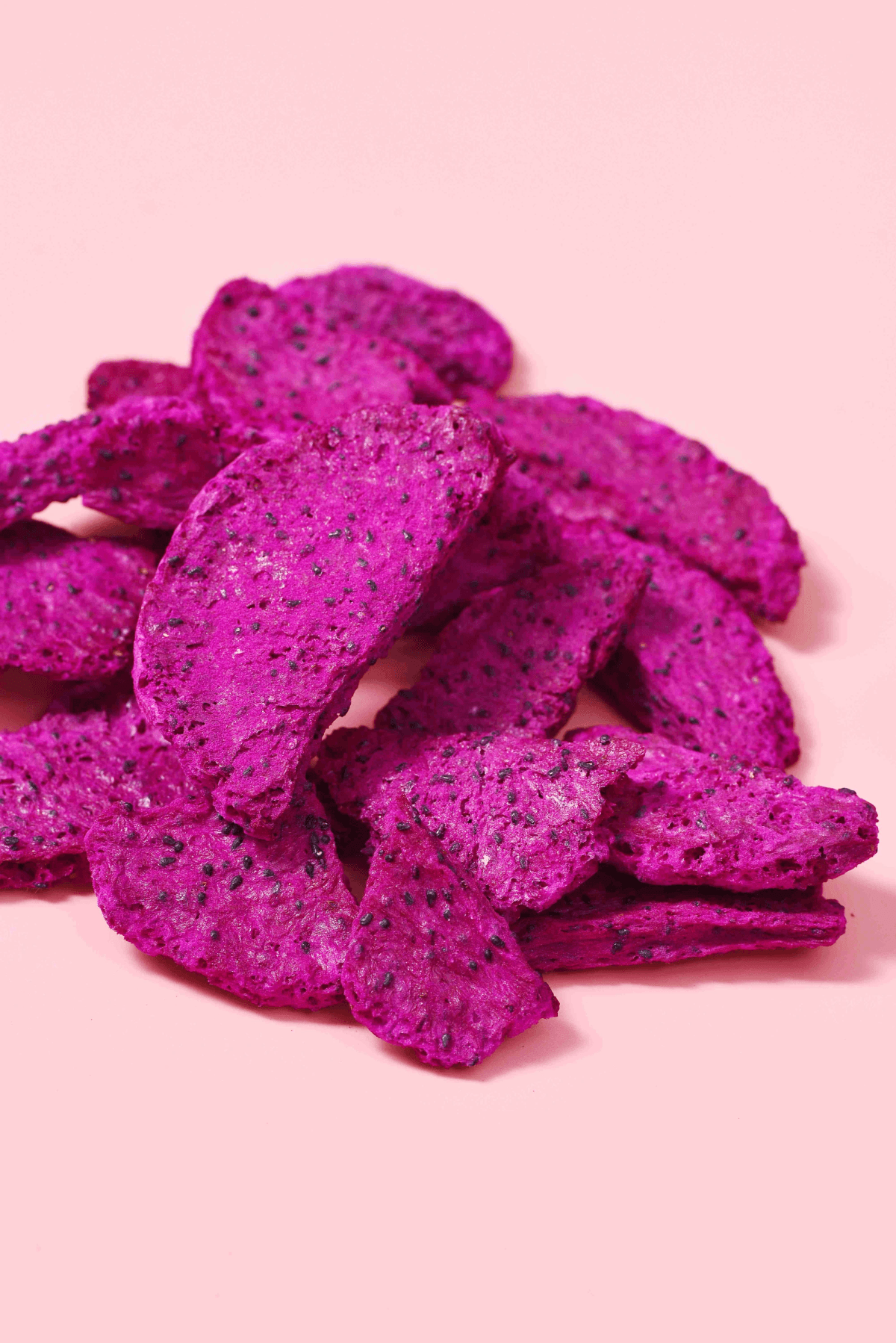 Deliciously vibrant slices of freeze dried dragon fruit. Deliciously vibrant slices of freeze dried dragon fruit.