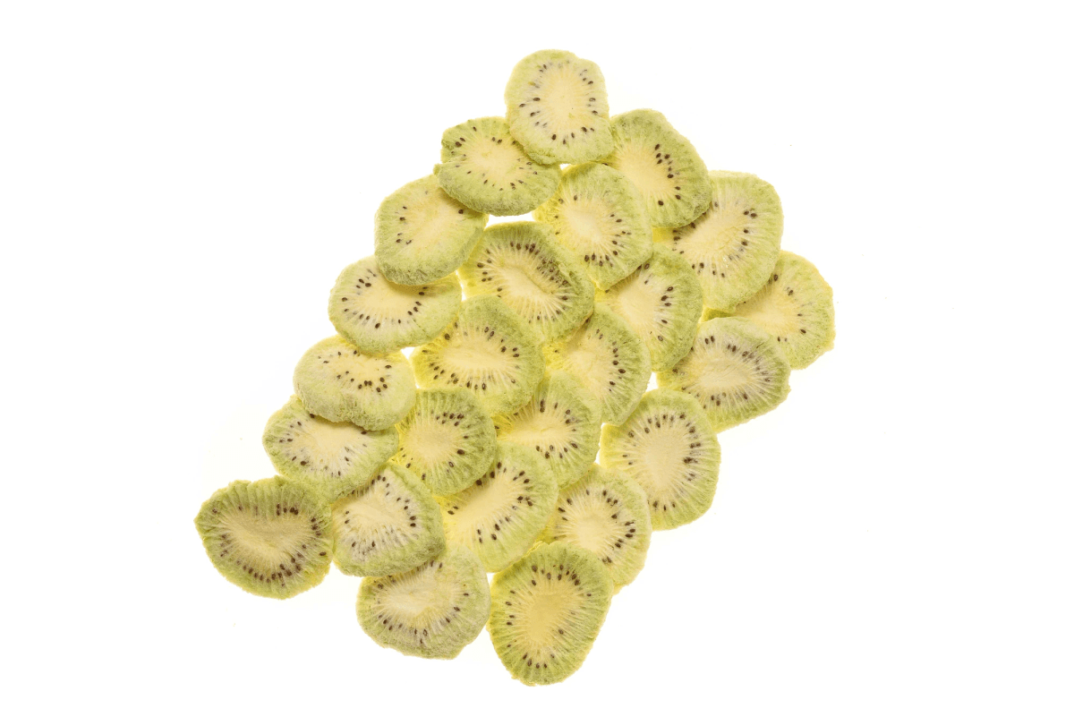 Delicious freeze dried kiwi slices showcasing their vibrant color Delicious freeze dried kiwi slices showcasing their vibrant color