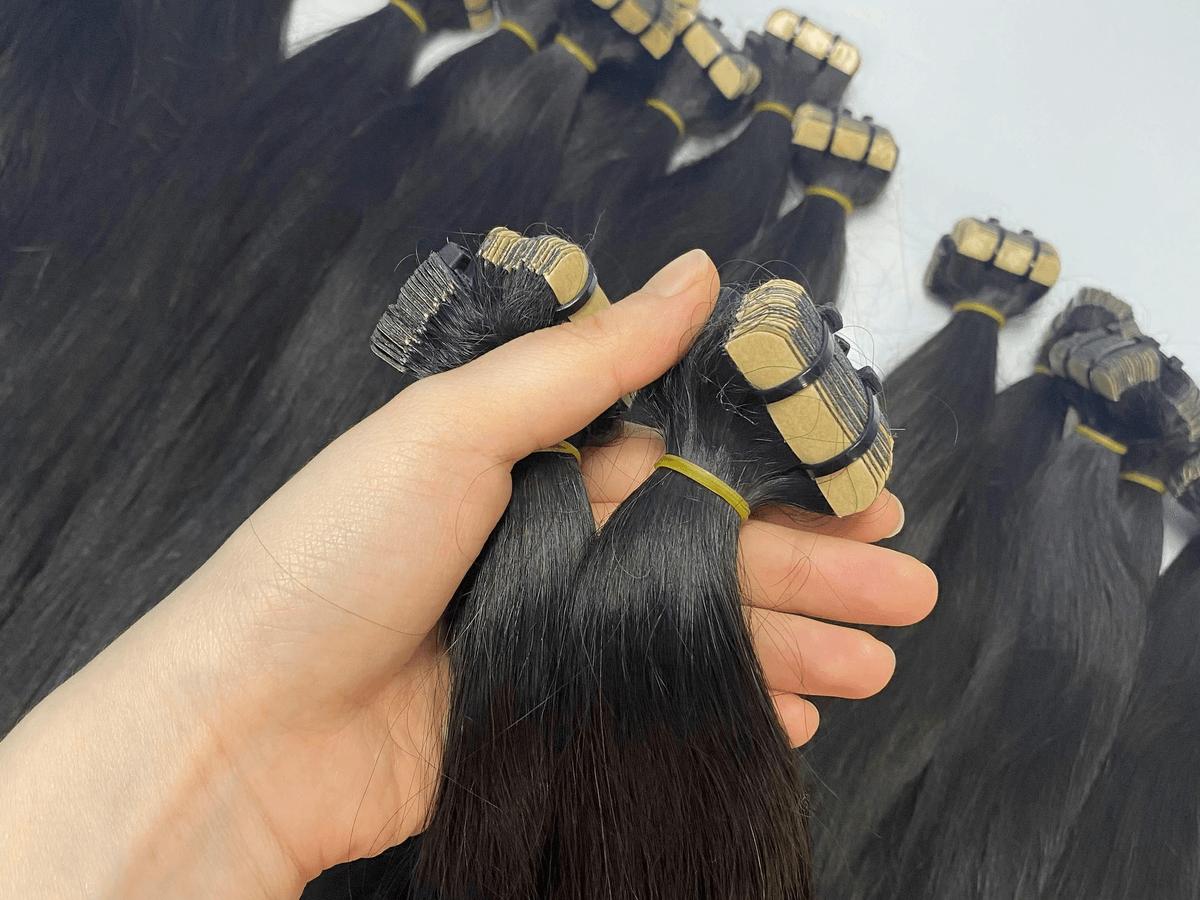 Close-up of Clip-In Hair Extensions being applied seamlessly Close-up of Clip-In Hair Extensions being applied seamlessly
