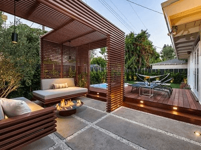 Beautiful view of low maintenance backyards showcasing composite decking. Beautiful view of low maintenance backyards showcasing composite decking.