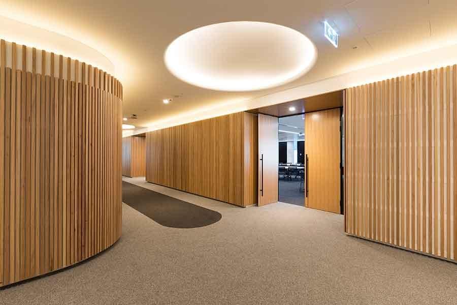 Stylish interior timber cladding enhancing warmth and aesthetics. Stylish interior timber cladding enhancing warmth and aesthetics.
