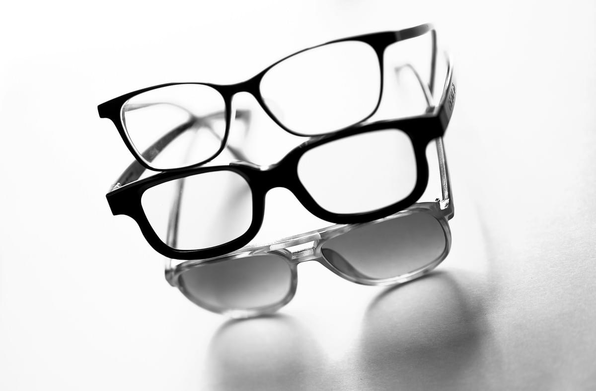 Trendy collection of thick rimmed glasses showcasing various styles. Trendy collection of thick rimmed glasses showcasing various styles.