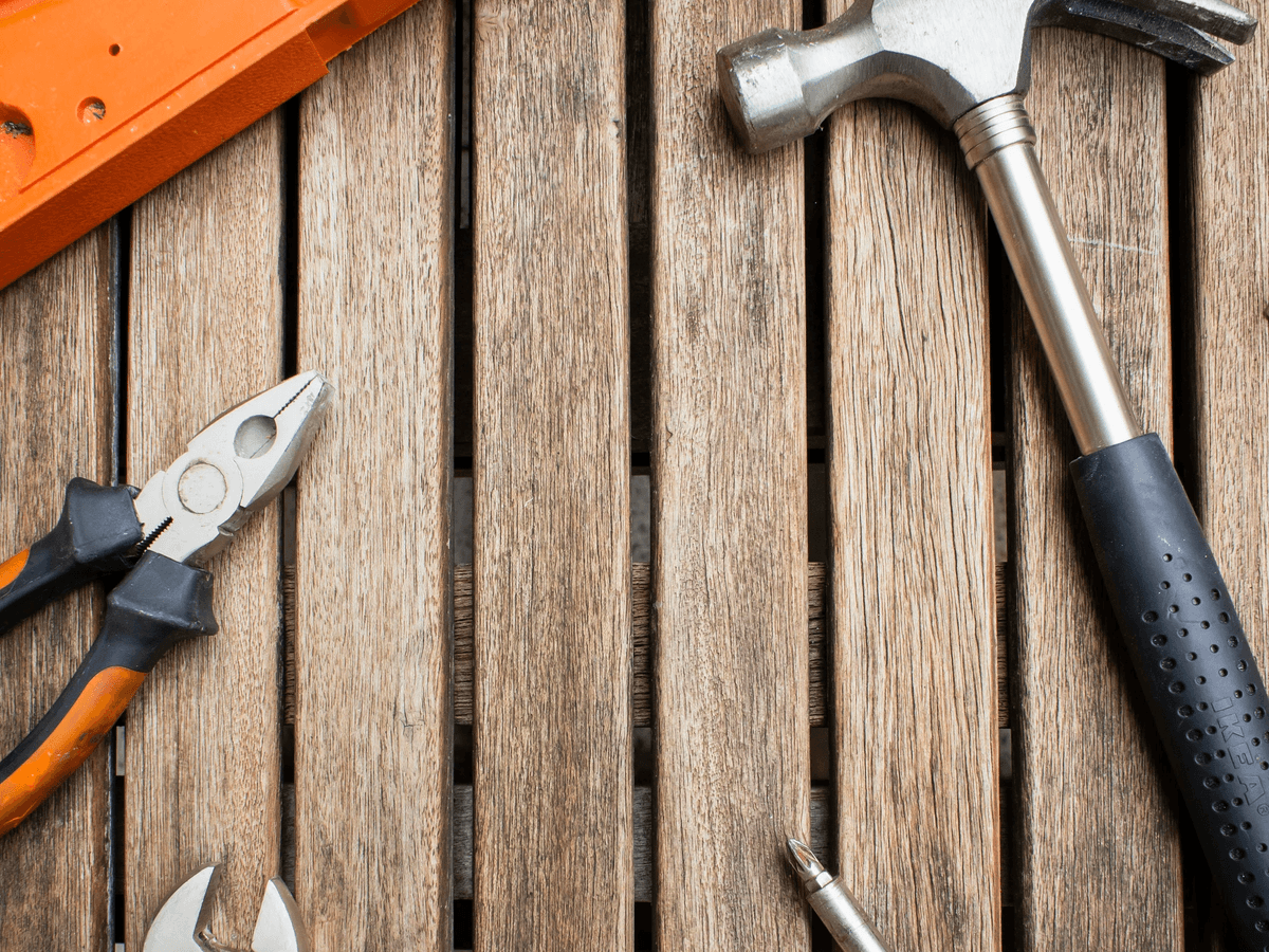 Tools laid out for inspection on workbench. Tools laid out for inspection on workbench.