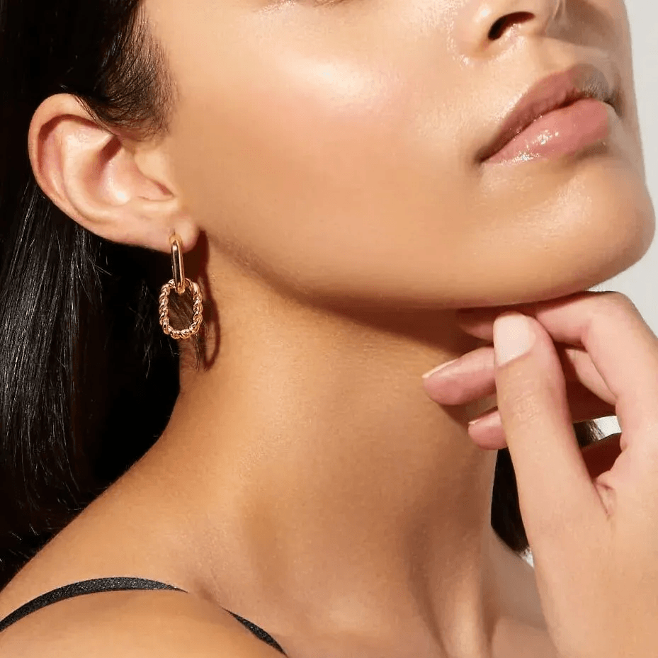 Stylish earring buds collection featuring silver and gold stud earrings Stylish earring buds collection featuring silver and gold stud earrings