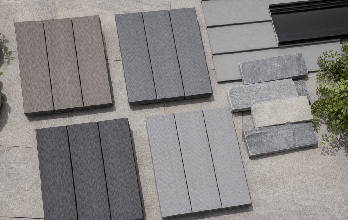 Grey composite decking samples in warm and cool undertones Grey composite decking samples in warm and cool undertones