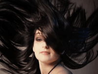 Stunning woman flaunting her raw curly hair bundles. Stunning woman flaunting her raw curly hair bundles.