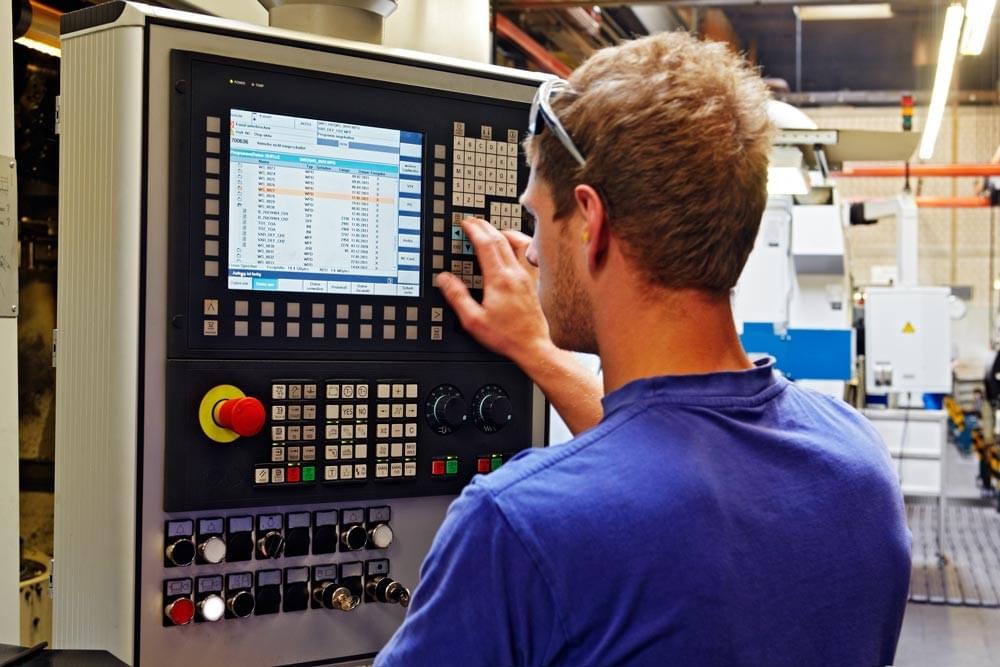 Illustration showing a CNC lathe in operation Illustration showing a CNC lathe in operation