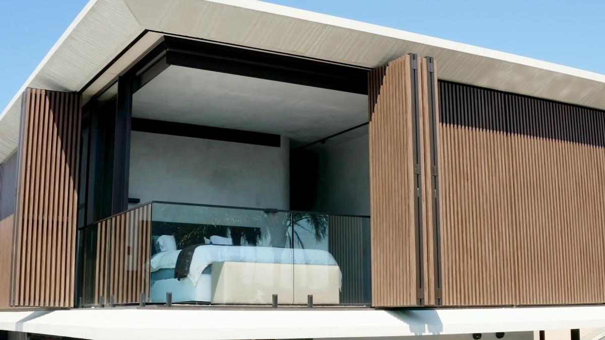 Stylish modern home showcasing innovative external cladding panels Stylish modern home showcasing innovative external cladding panels